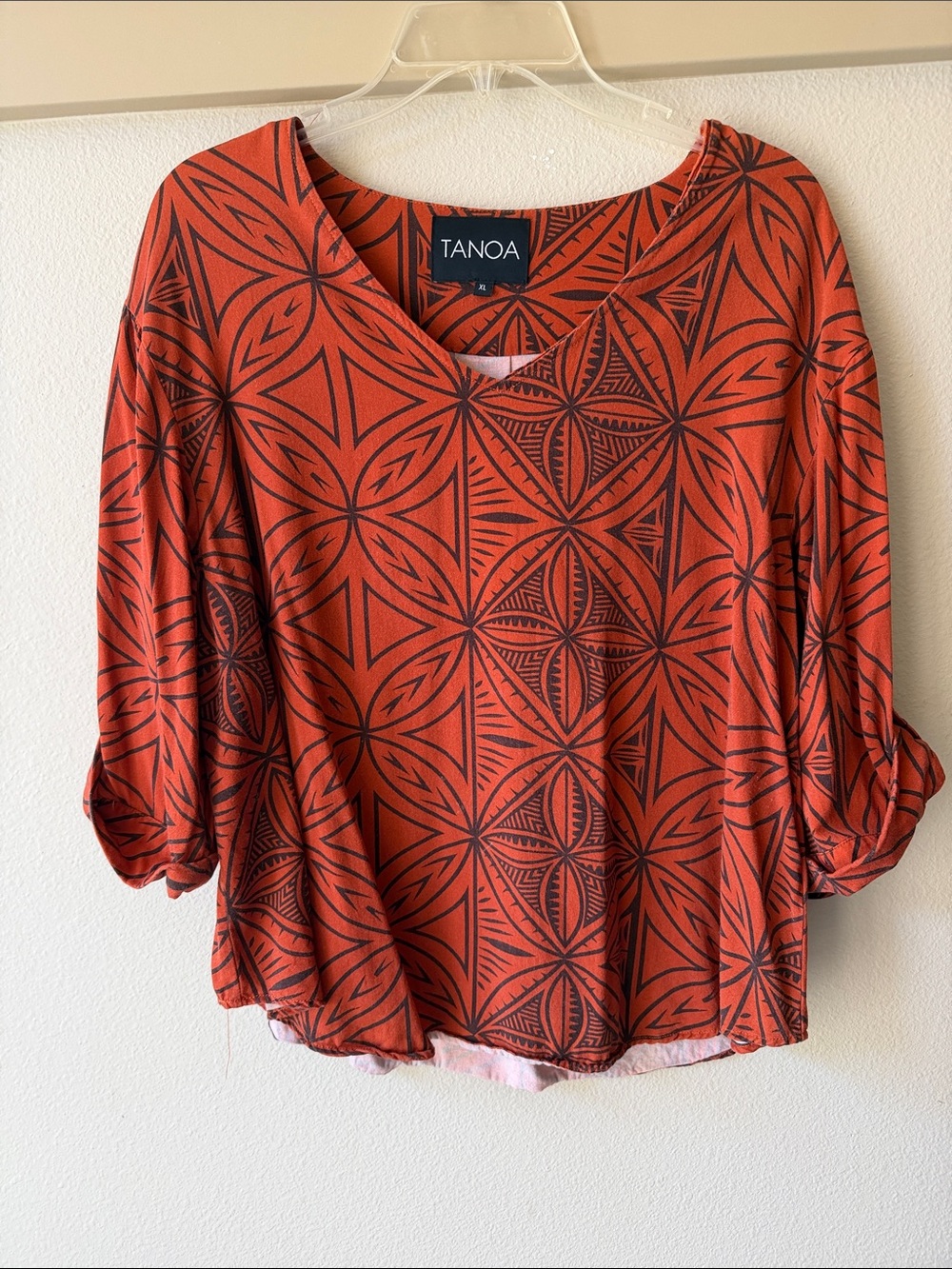 Tanoa Rust Orange Geometric Print V-Neck Long Sleeve Top
